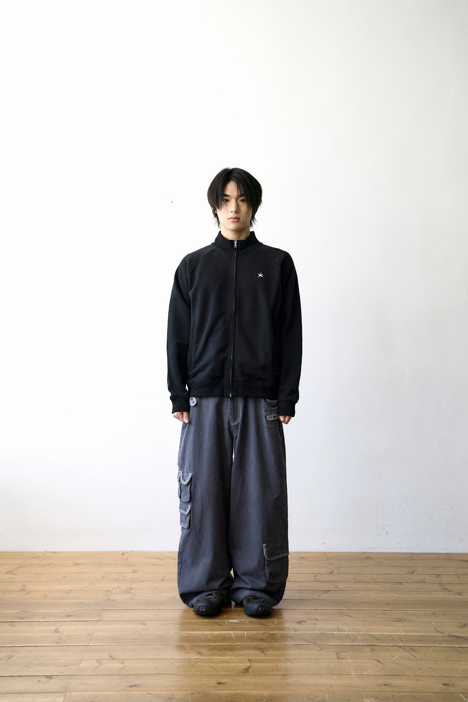 TCM mini logo jersey zip-up (black)