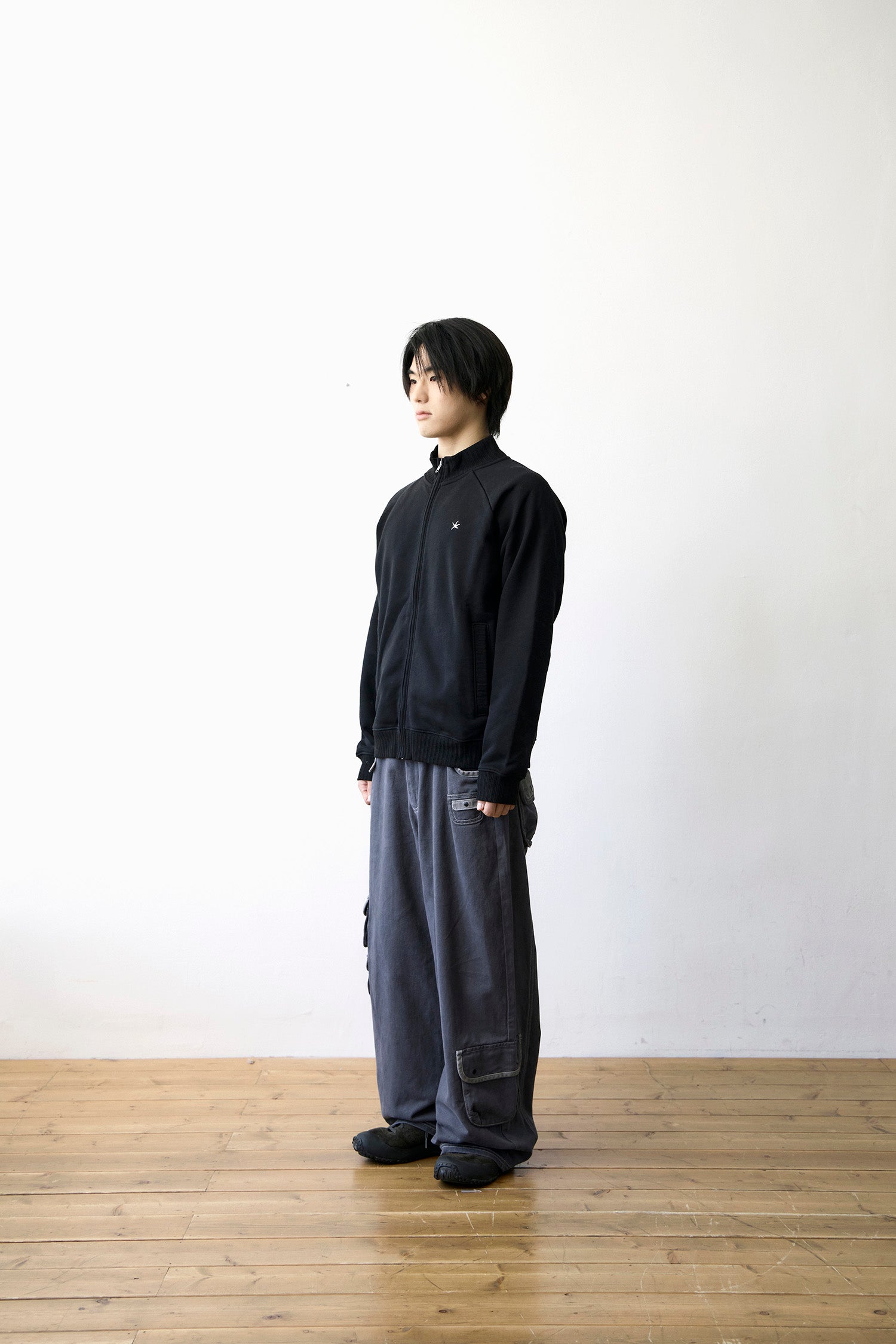 TCM mini logo jersey zip-up (black)