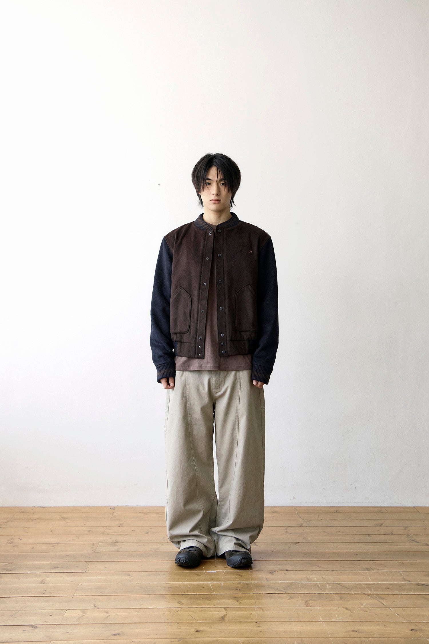 TCM mini logo varsity jacket (brown/navy)