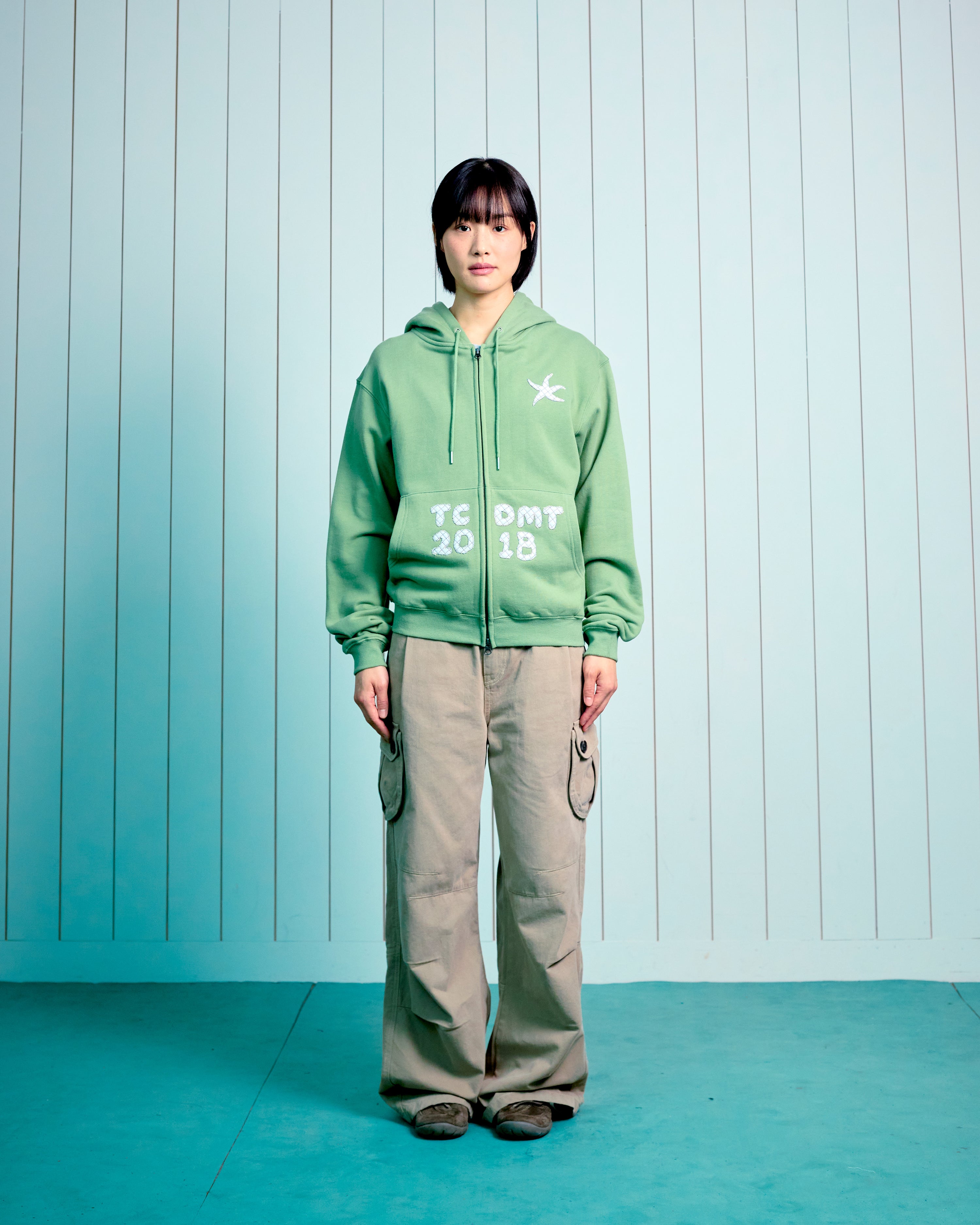 TCM logo applique hooded zip-up (green)